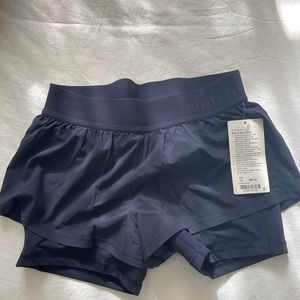 LULULEMON BOX IT OUT SHORTS SIZE 10 NAVY
